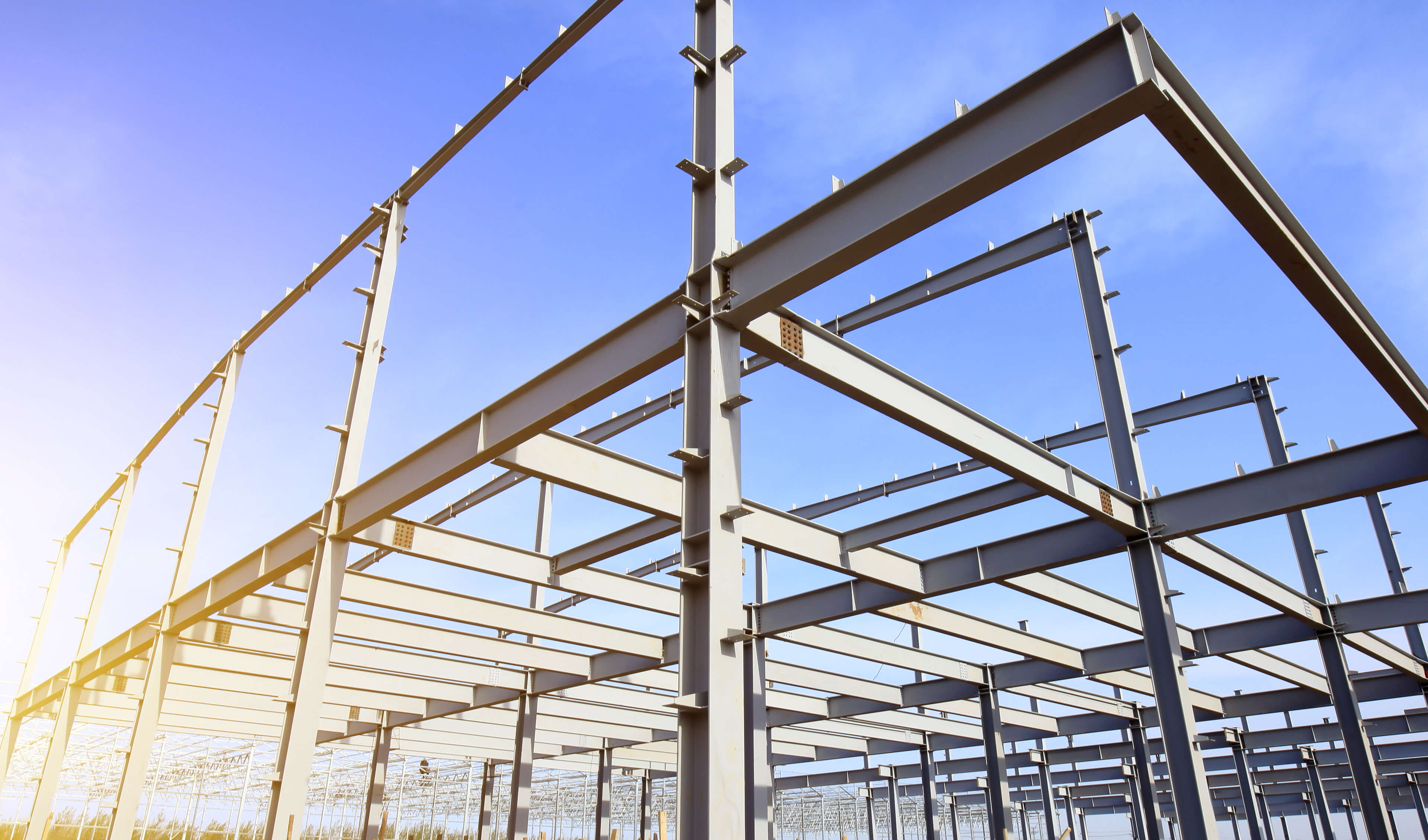 steel beams in the air forming a building